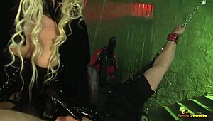 restrained slave sucks mistress boots then fucks chained in leather