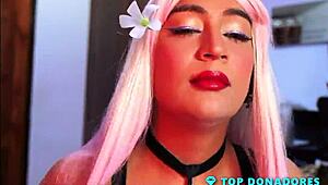 transsexual ricoss stuffs object deep in penis while showing huge tits