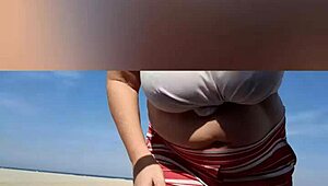 mature blonde with big natural tits and pussy lips solos sexy on the beach
