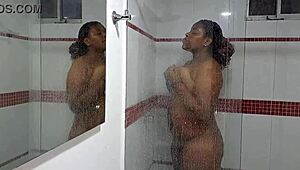 spy cam catches ebony stepsis showering her juicy tits and ass