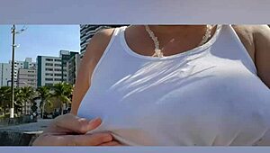 mature blonde with big natural tits and pussy lips solos sexy on the beach