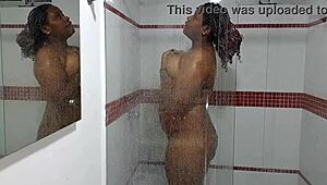 spy cam catches ebony stepsis showering her juicy tits and ass