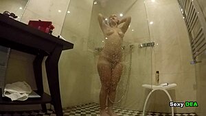 goddess sexydea pounds wet pussy in steamy shower after cowgirl ride