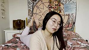 cute chinese girl spreads shaved pussy with vibrator