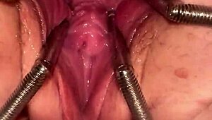 Fist Queen Stretches Pussy Wide with Shiny Metal Ring Insert