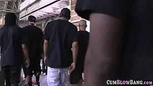A group scene features interracial oral action