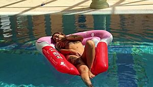 canadian milf heidi gets horny underwater in pool fingering her juicy big tits