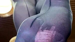 goddess spreads long nylon legs on desk teasing toes and big ass close up