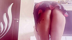 Big tits babe plays with her sexy dress and pussy