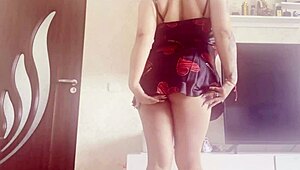 Big tits babe plays with her sexy dress and pussy