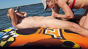 hot athletic couple have sex on a jetski in lake