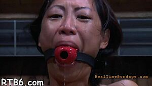 ferocious whipping for angel in tight bondage