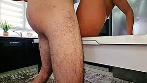 real amateur couple enjoys a quick kitchen session together