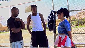 Erotic asian cheerleader motivates her black friends with a threesome with lots of hair pulling