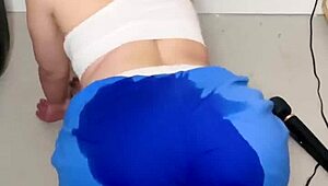 cute gym girl tries outfit and squirts in shorts