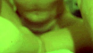 a slender beauty is having a great time on the couch