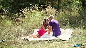 loving couple enjoys outdoor oral fun