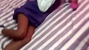 Black skinny 18 year old girl sucks vibrator on camera