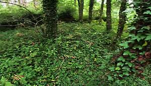 Girl cycling in woods helps with outdoor task