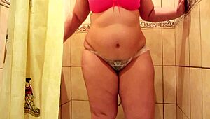 a hairy pussy pees in white panties and nylon tights