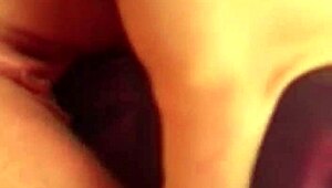 blonde and brunette play with boobs in front of camera