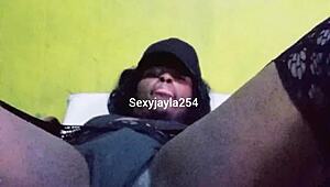 Naughty crossdresser spreads her ass up close