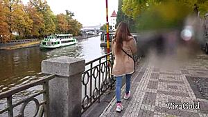 Beautiful girl with long hair shows her pretty face after