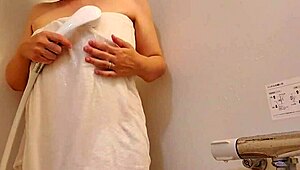 A married woman masturbates alone in her room